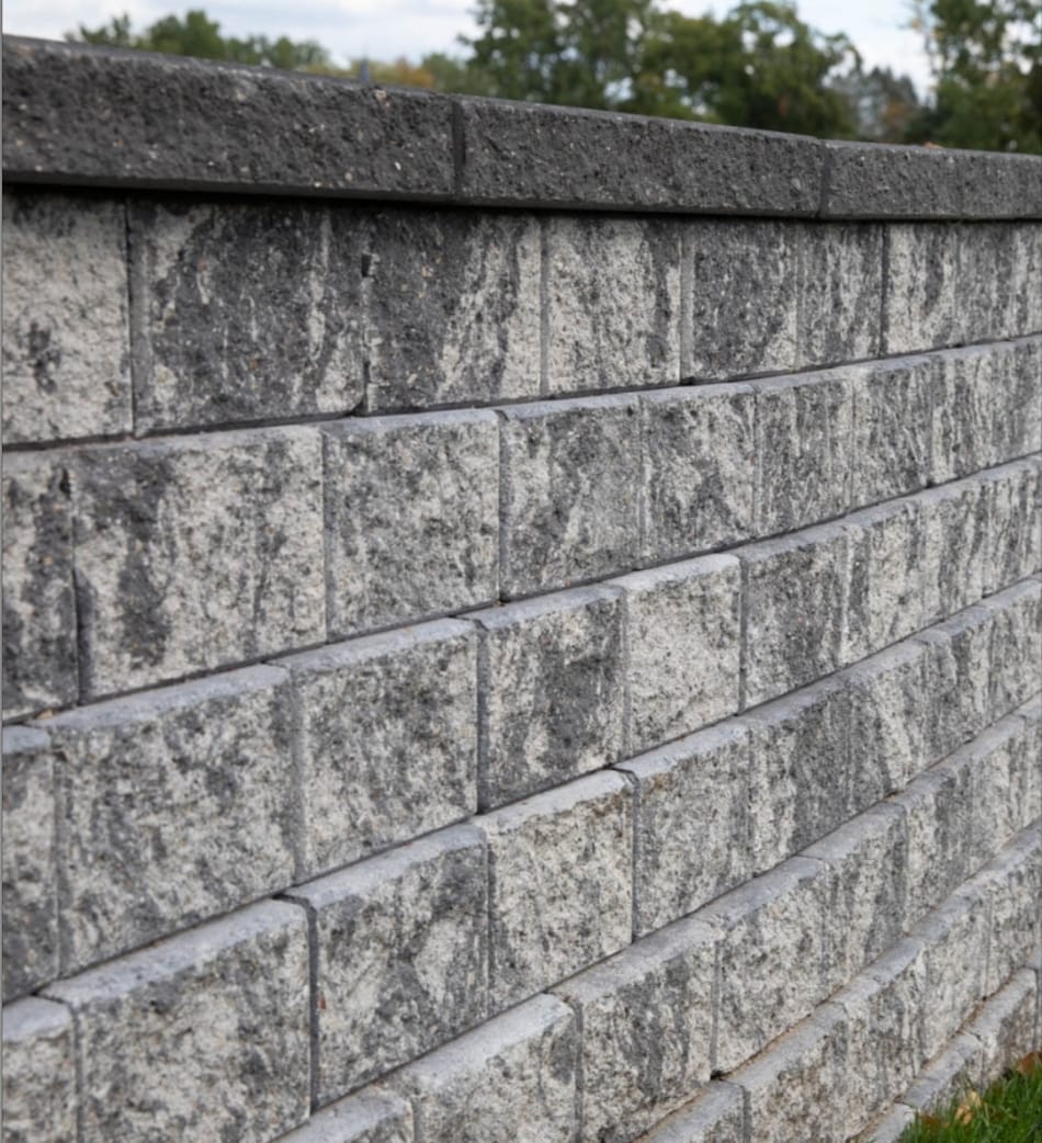 Installed retaining wall cap